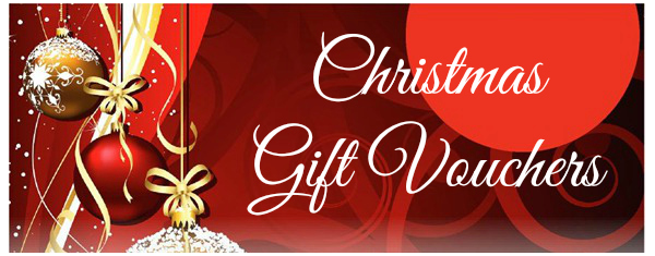 Banner for gift vouchers featuring ornate decorations, including a golden bauble and ribbons on a red and gold background.