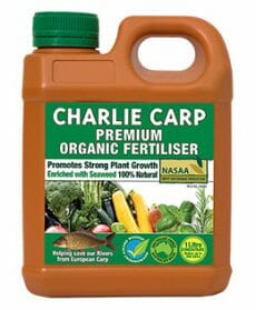 Plastic container of Charlie Carp Premium Organic Liquid Fertilizer Concentrate 1L. Promotes strong plant growth, enriched with seaweed, 100% natural, and NASAA certified organic.