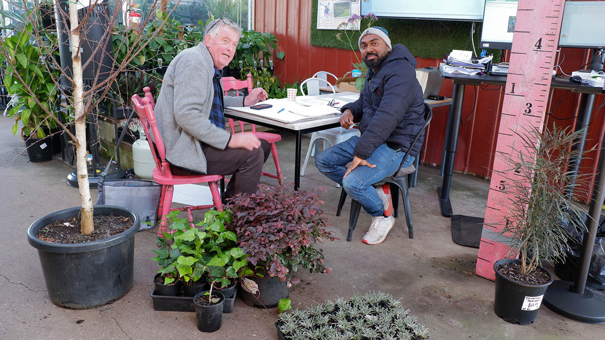Chris and Male Customer in garden design area