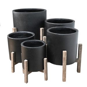 five decorative feature pots for plants all different sizes with brown wooden leg stands