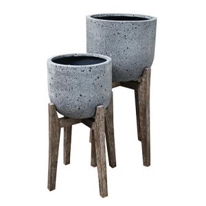 Two UrbanStyle Egg with Leg GreyStone pots for feature plants with brown wooden leg stands