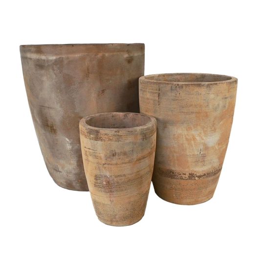 Three terracotta pots on a white background. for feature plants