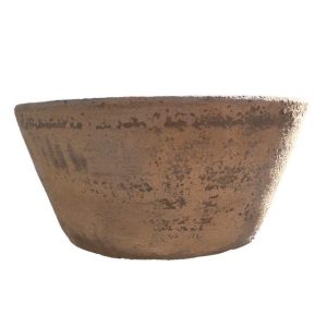 A large terracotta bowl on a white background.