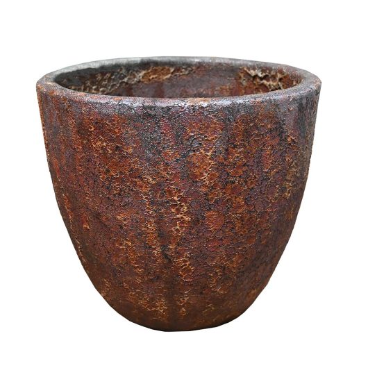 A large rusty planter pot on a white background. decorative feature pot brown rustic for plants