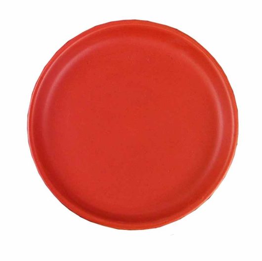 A red pot saucer plate on a white background.