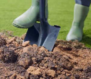 digging hole in clay soil