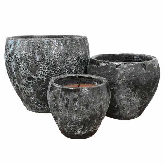 Three varying-sized, textured, dark grey Seafoam Bellagio Planters on a white background.