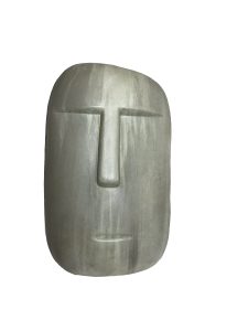 A large, smooth stone sculpture, measuring 20x3x50cm, depicts a stylized human face with simple, minimal features, including a prominent nose and closed eyes. The Iridami Relief Dewi Sri White 20x3x50cm (Copy) stands against a plain white background.
