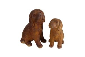 Two brown dog statues, one larger and one smaller, sit side by side against a white background. The statues are from UrbanCrete Deep Bowl Cement S 70x61cm (Copy).