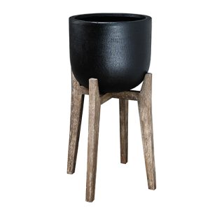 Black pot on a wooden stand with four angled legs.