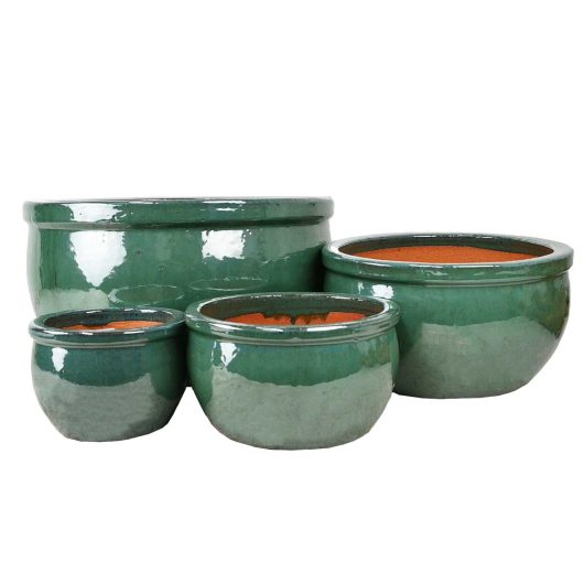Four black ceramic pots of different sizes, including a Glazed Flat-Rim Bowl Black S 20x12cm, are displayed side by side on a plain white background.